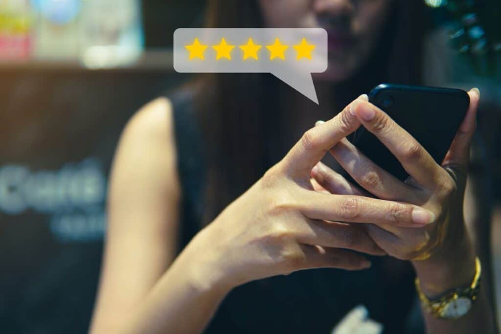 Customer review and star rating concept on a smartphone.